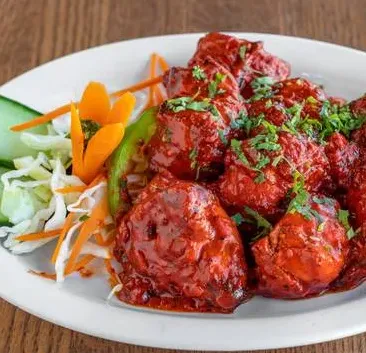 Lamb Curry Bowl — slow-cooked Indian rice bowl at My Spice N Rice Douglasdale Calgary