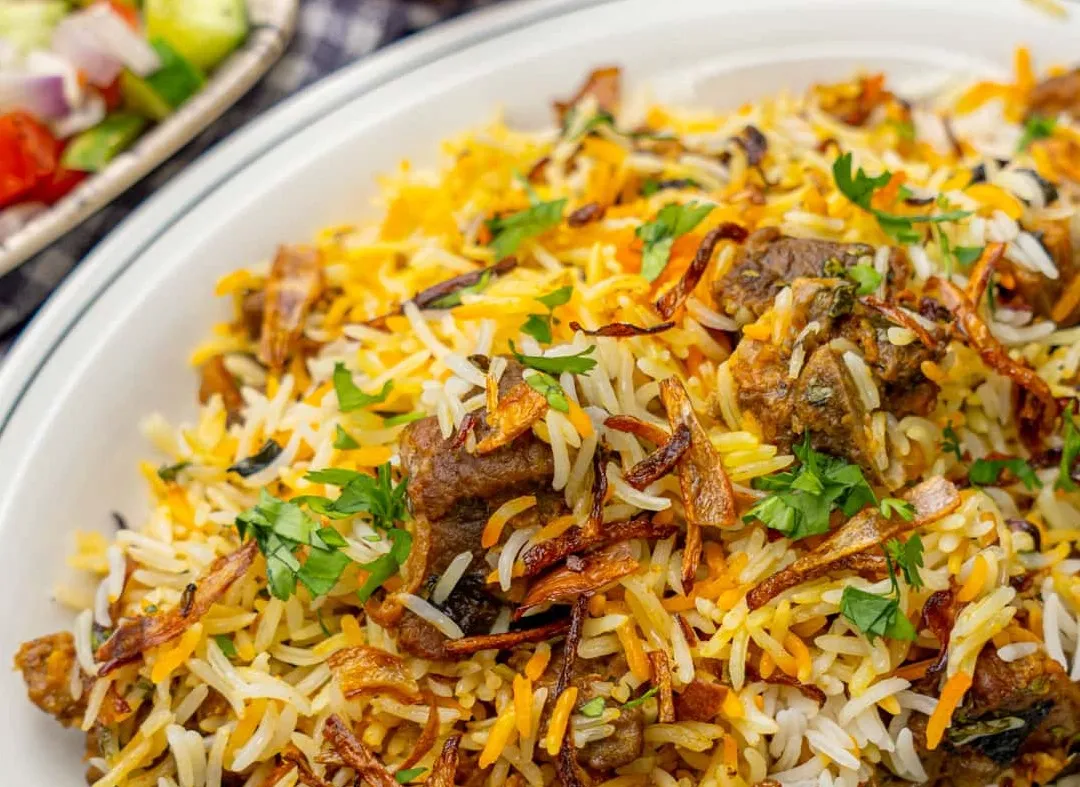 Lamb Curry Bowl — slow-cooked lamb curry on masala rice at My Spice N Rice, SE Calgary